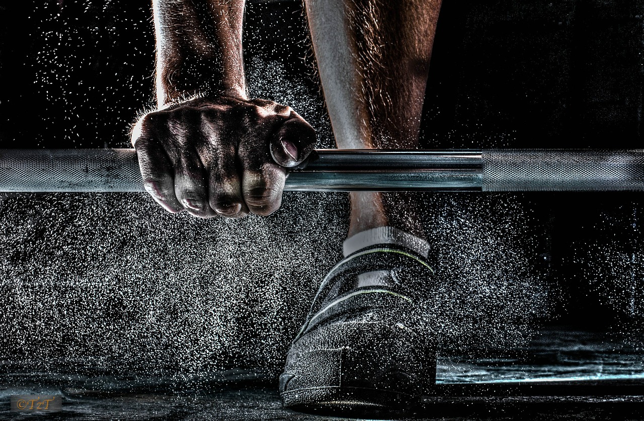 Bodybuilding Harm Your Joints barbell chalk grip