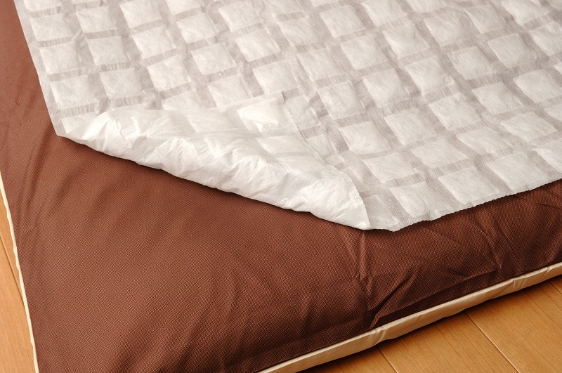 waterproof mattress pad on top of mattress