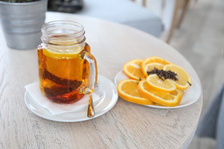 Kombucha Tea with lemons on table